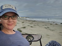 Book worming and nerdy at the beach.