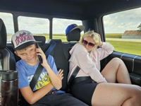 The boy finally got his new phone as a surprise at the end of the trip.