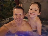 Just a couple of dudes relaxing in the hot tub.